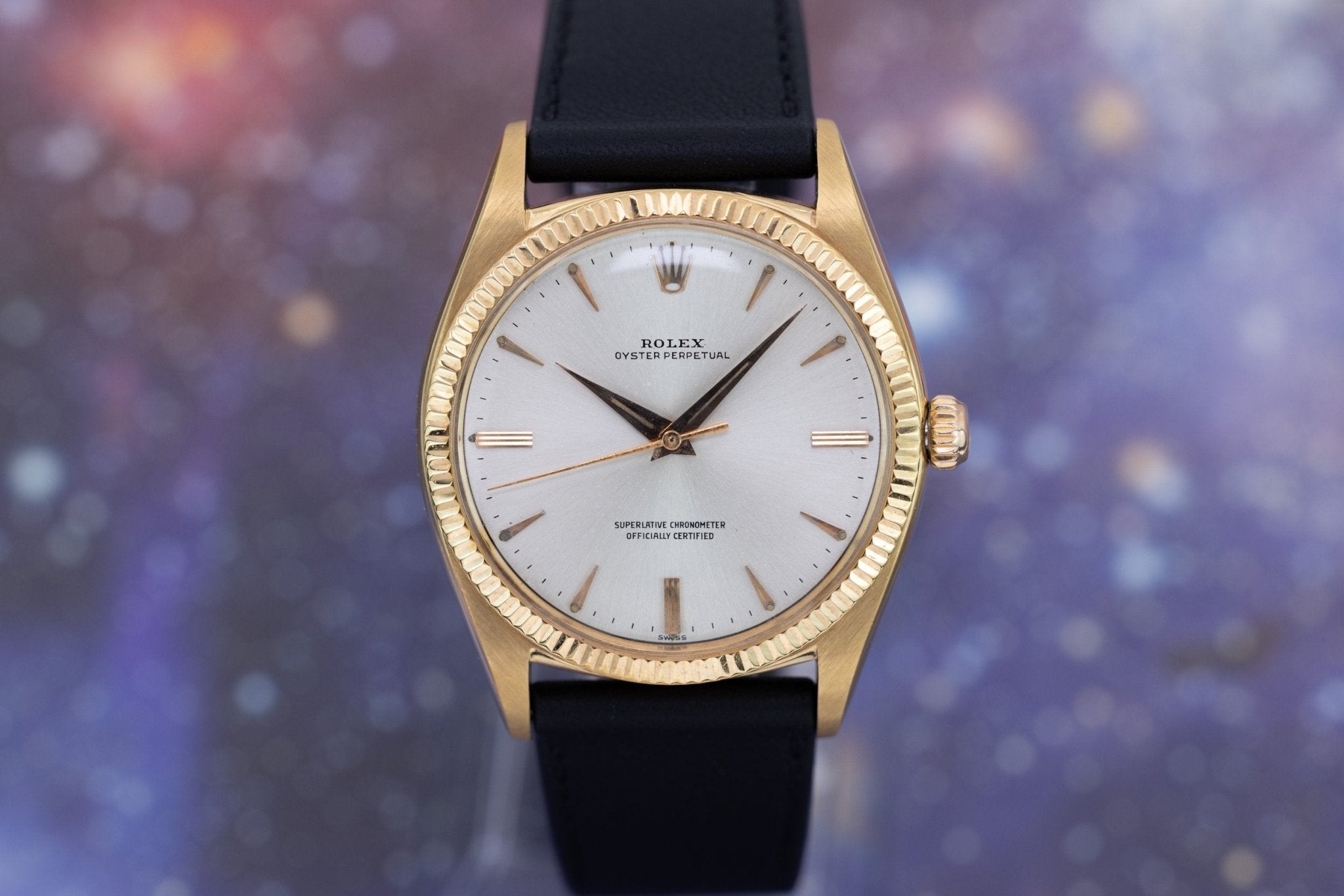 1958 Rolex Oyster Perpetual Ref. 1013 | 18K Yellow Gold | Dauphine Hands | Silver Dial - Sierra Time Co