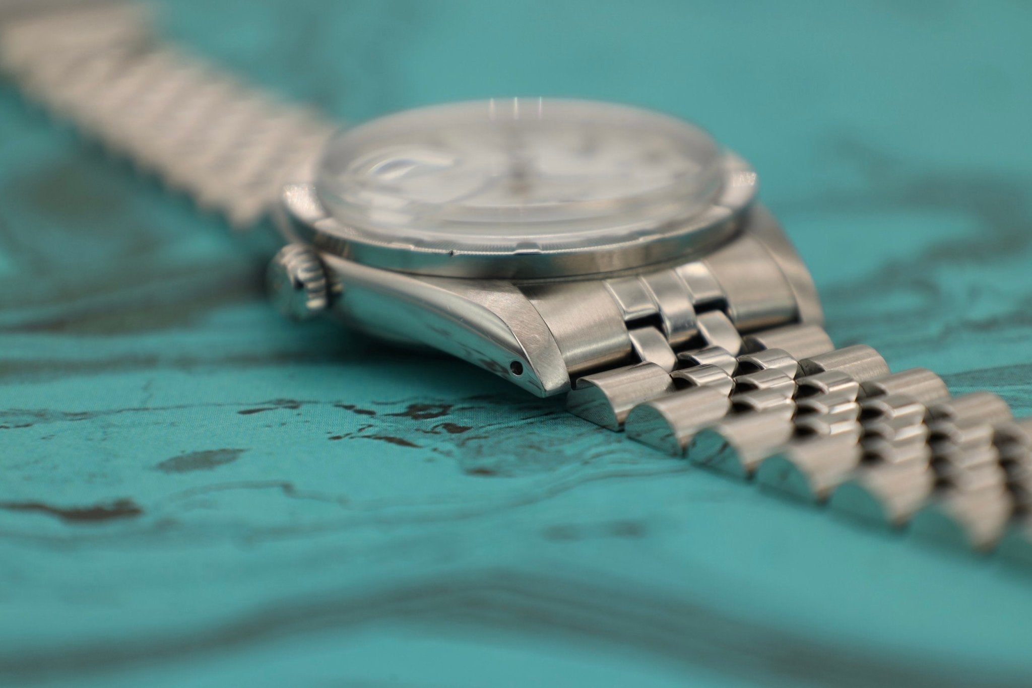 1988 Rolex Date Ref. 15010 White Roman Dial | Jubilee Bracelet - Sierra Time Co