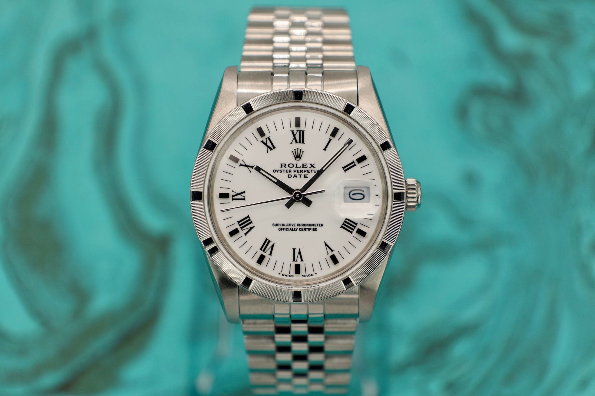 1988 Rolex Date Ref. 15010 White Roman Dial | Jubilee Bracelet - Sierra Time Co