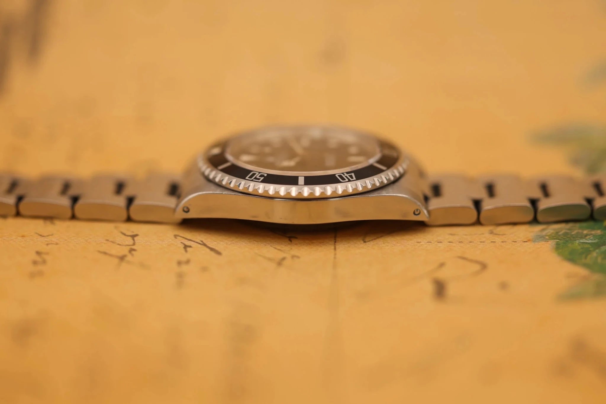 1995 Rolex Submariner Ref. 14060 | Creamy Patina | Box and Papers - Sierra Time Co