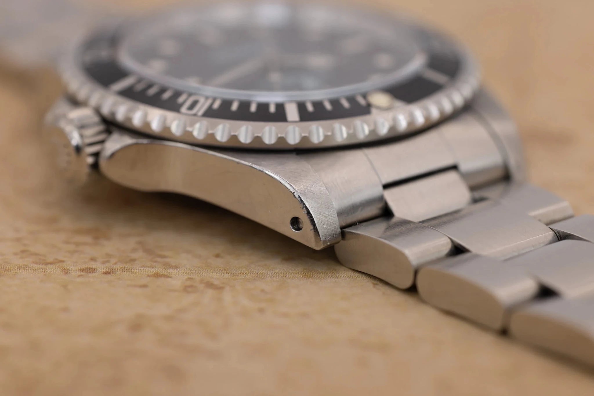 1995 Rolex Submariner Ref. 14060 | Tritium Dial | Navy Blue Bezel | Box and Papers - Sierra Time Co
