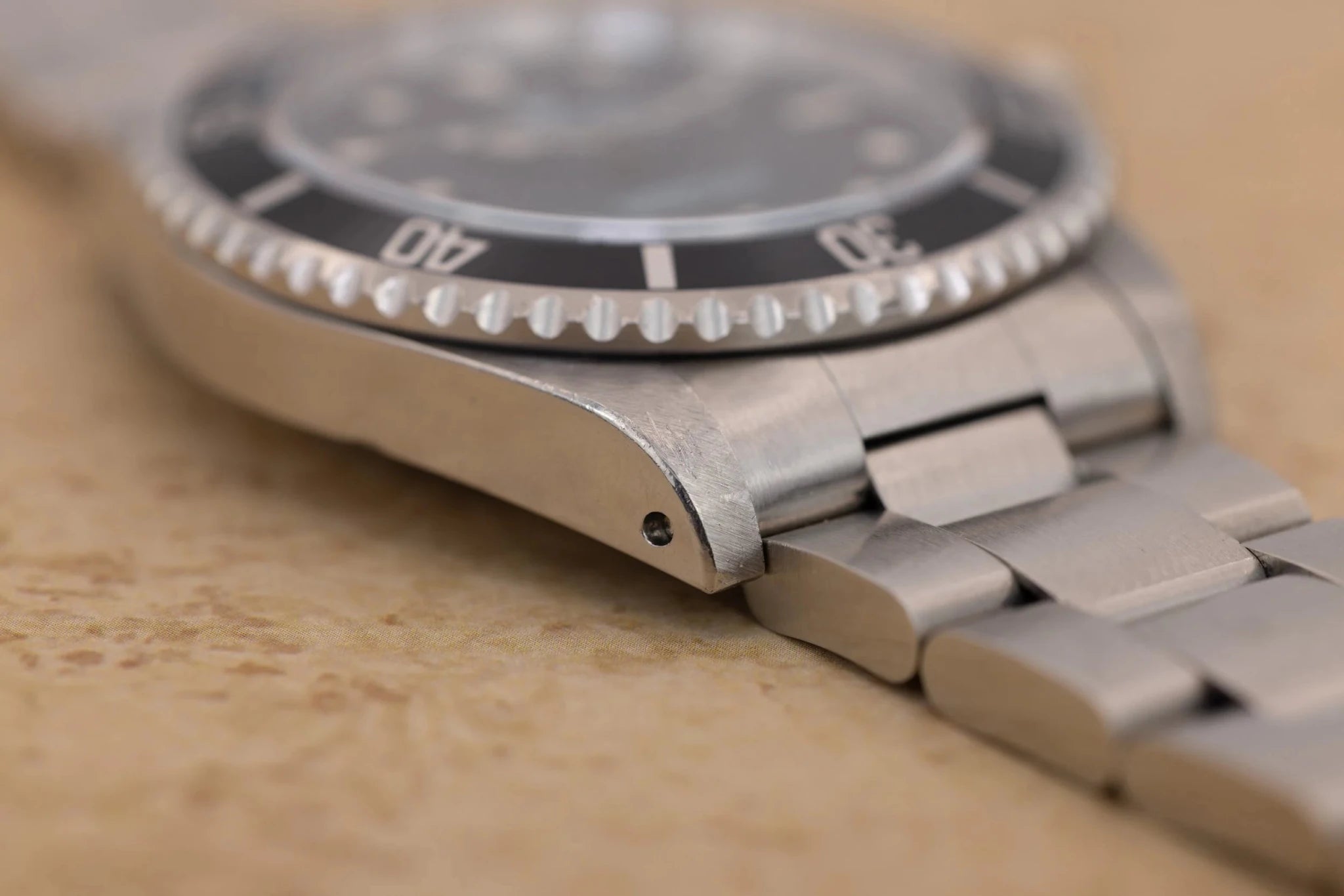 1995 Rolex Submariner Ref. 14060 | Tritium Dial | Navy Blue Bezel | Box and Papers - Sierra Time Co