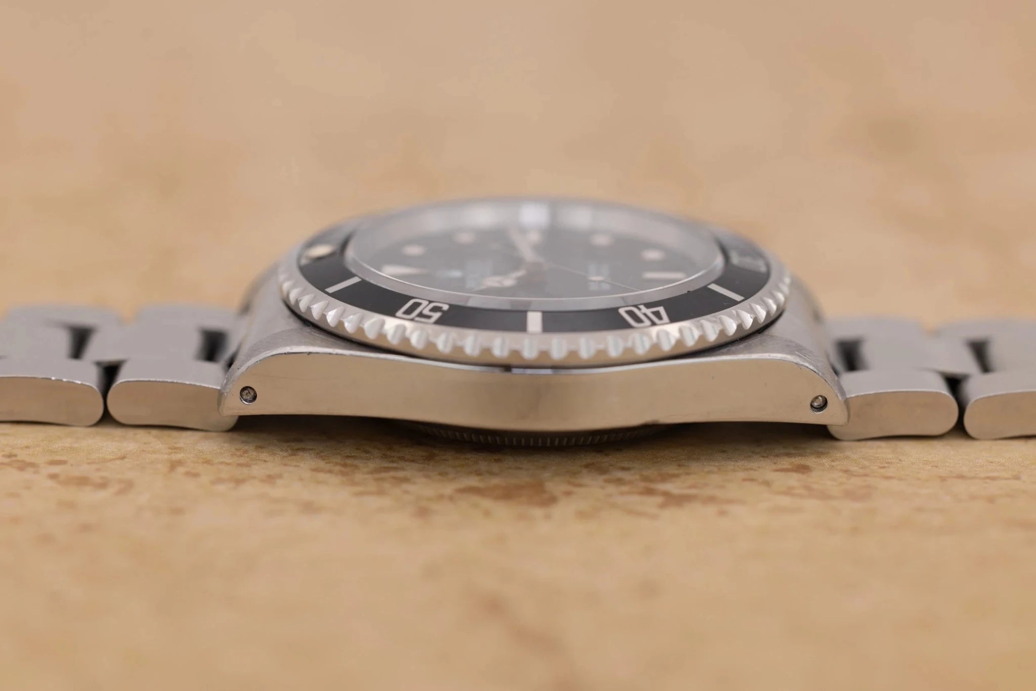 1995 Rolex Submariner Ref. 14060 | Tritium Dial | Navy Blue Bezel | Box and Papers - Sierra Time Co