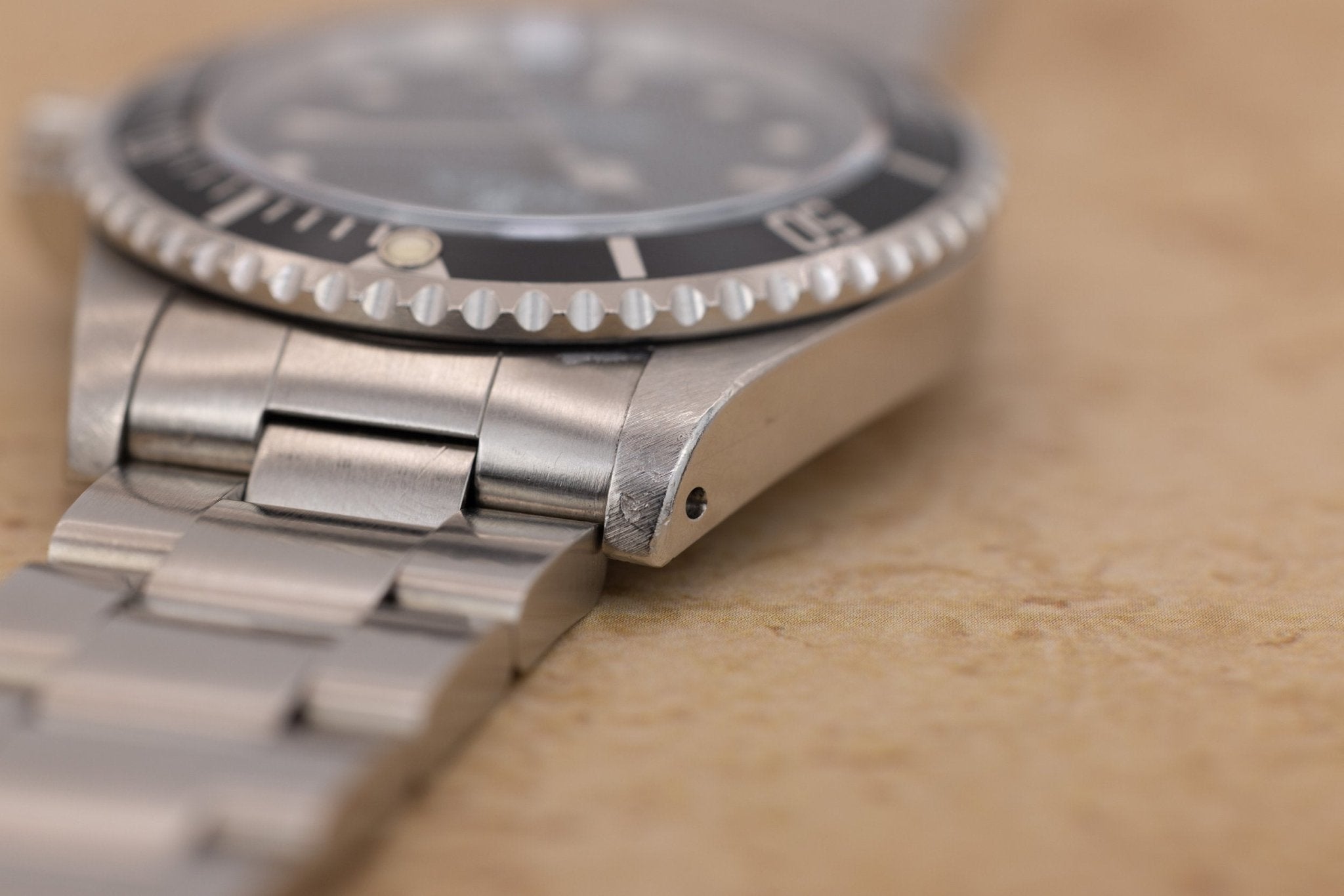 1995 Rolex Submariner Ref. 14060 | Tritium Dial | Navy Blue Bezel | Box and Papers - Sierra Time Co