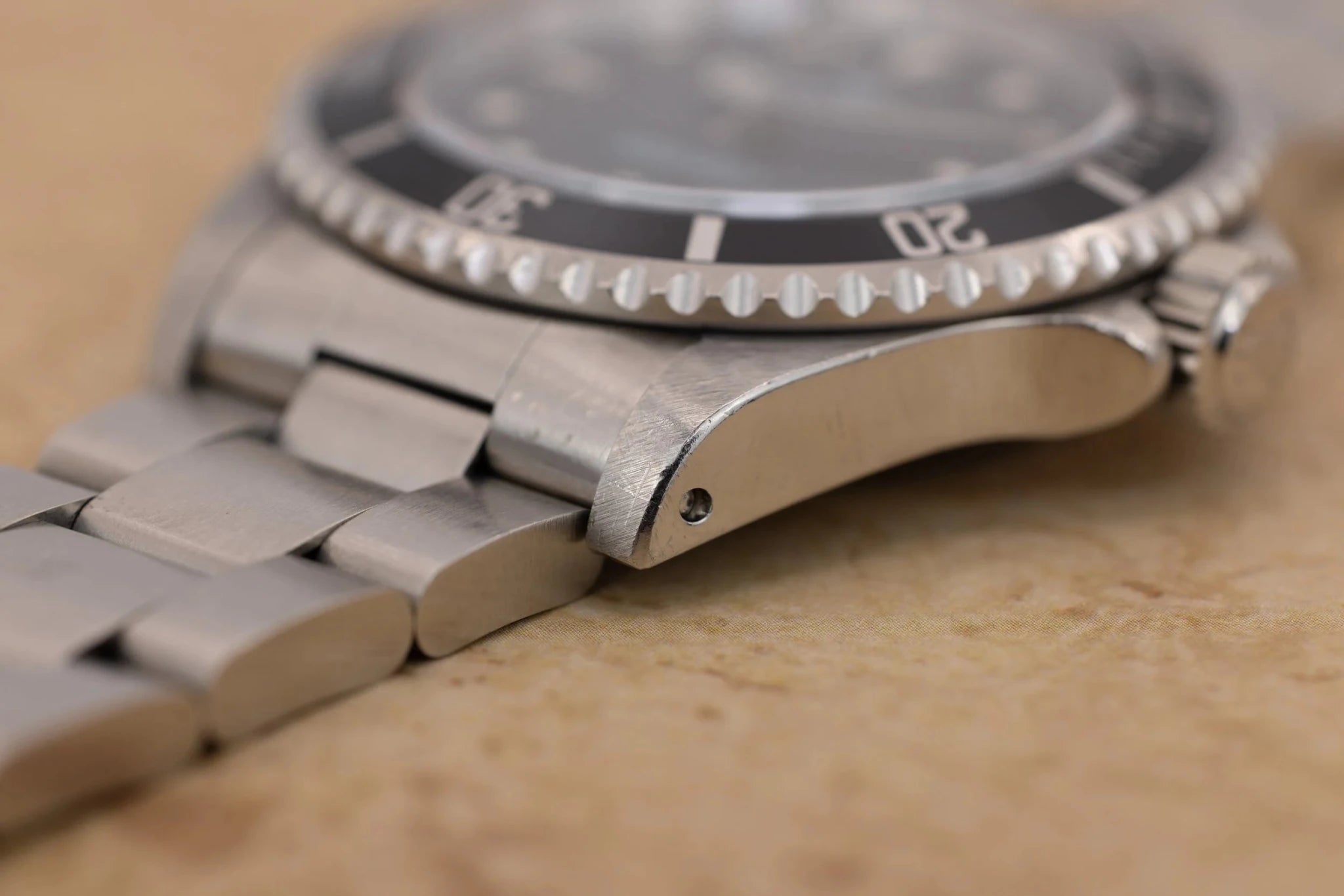 1995 Rolex Submariner Ref. 14060 | Tritium Dial | Navy Blue Bezel | Box and Papers - Sierra Time Co