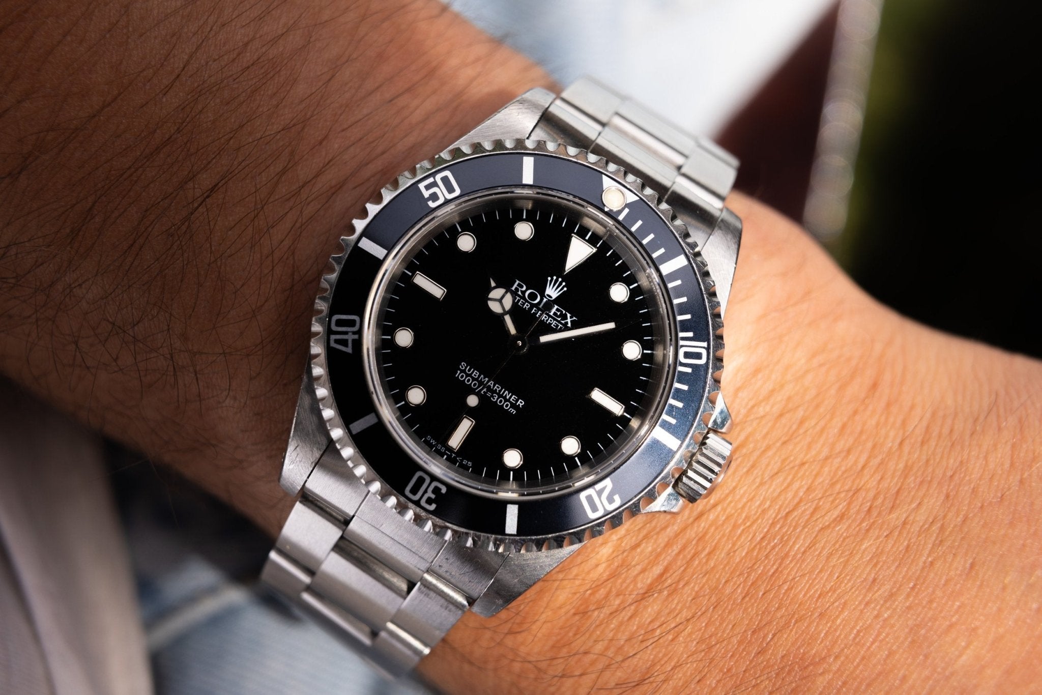 1995 Rolex Submariner Ref. 14060 | Tritium Dial | Navy Blue Bezel | Box and Papers - Sierra Time Co