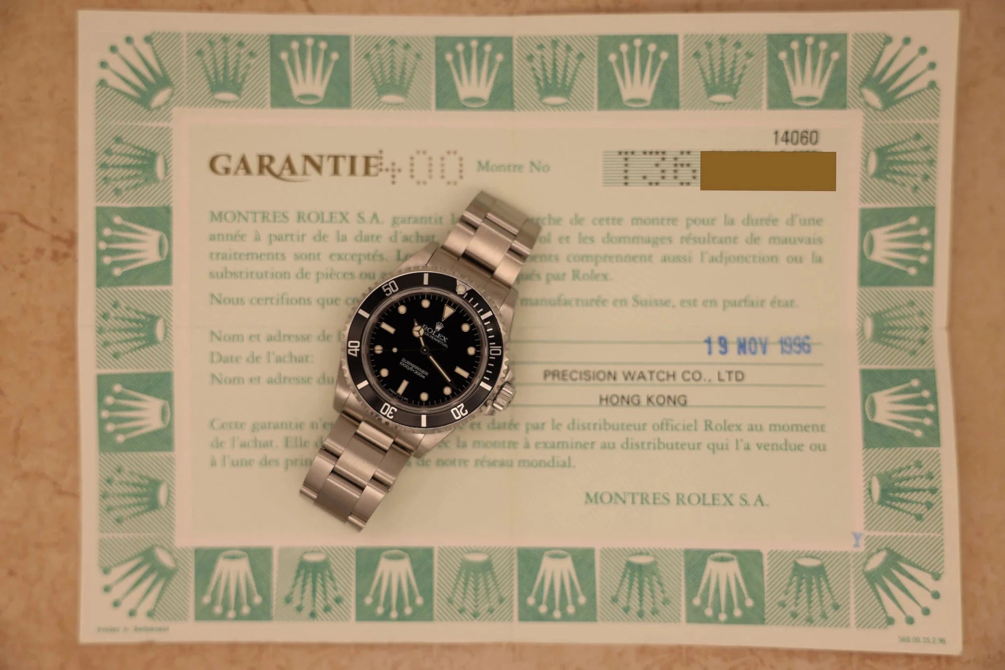 1996 Rolex Submariner Ref. 14060 | Creamy Patina | Papers - Sierra Time Co