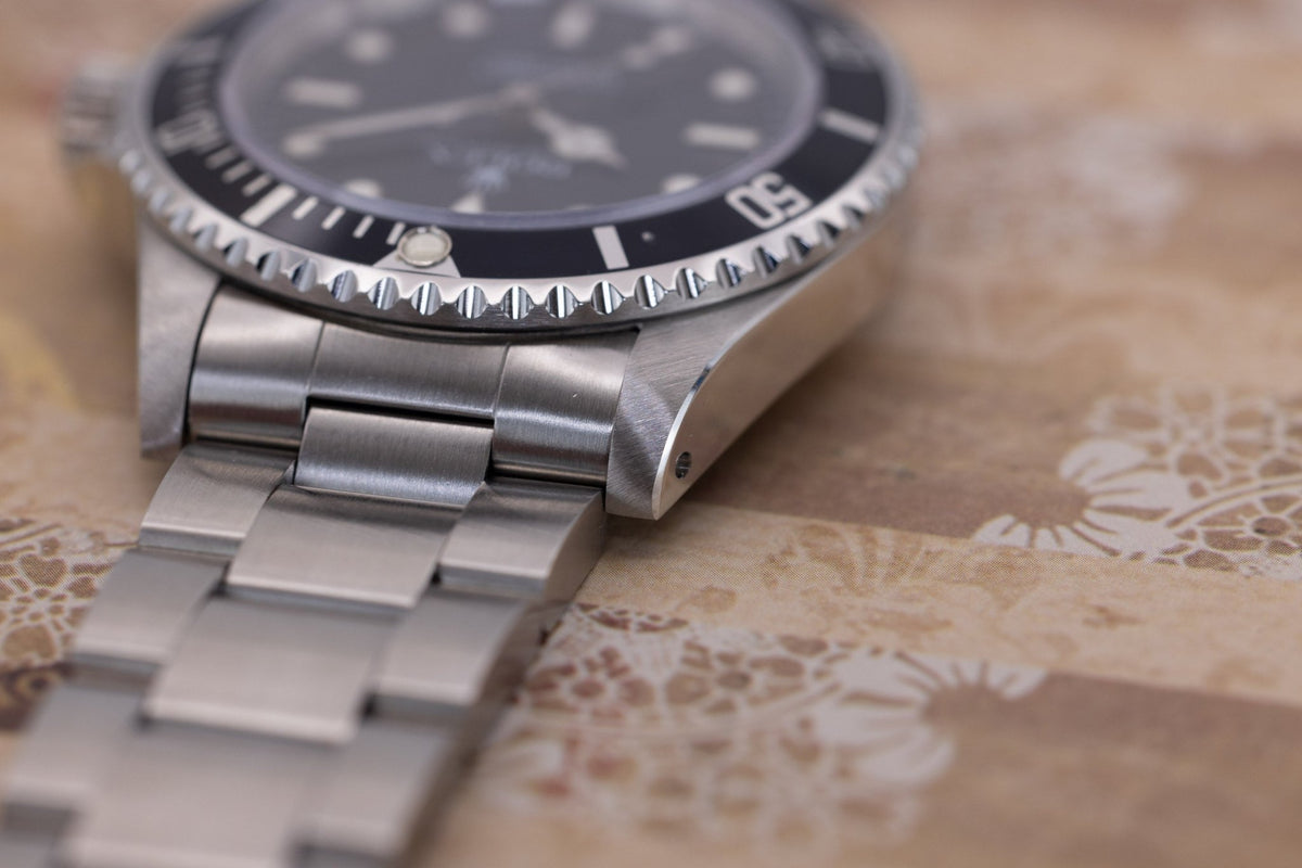 1996 Rolex Submariner Ref. 14060 | Tritium Dial | Box and Papers - Sierra Time Co