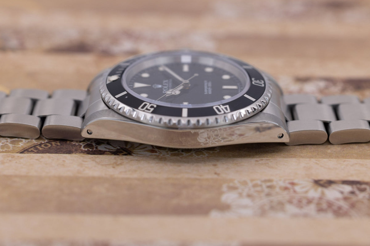 1996 Rolex Submariner Ref. 14060 | Tritium Dial | Box and Papers - Sierra Time Co