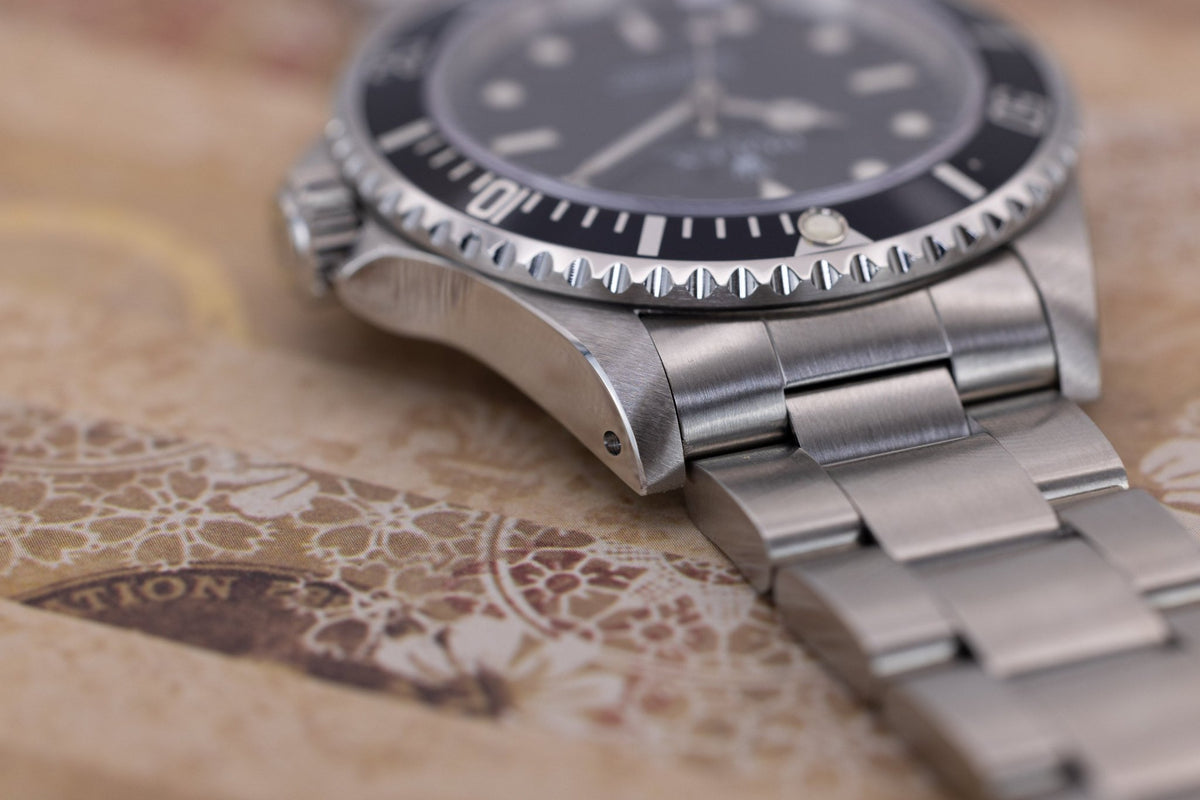 1996 Rolex Submariner Ref. 14060 | Tritium Dial | Box and Papers - Sierra Time Co
