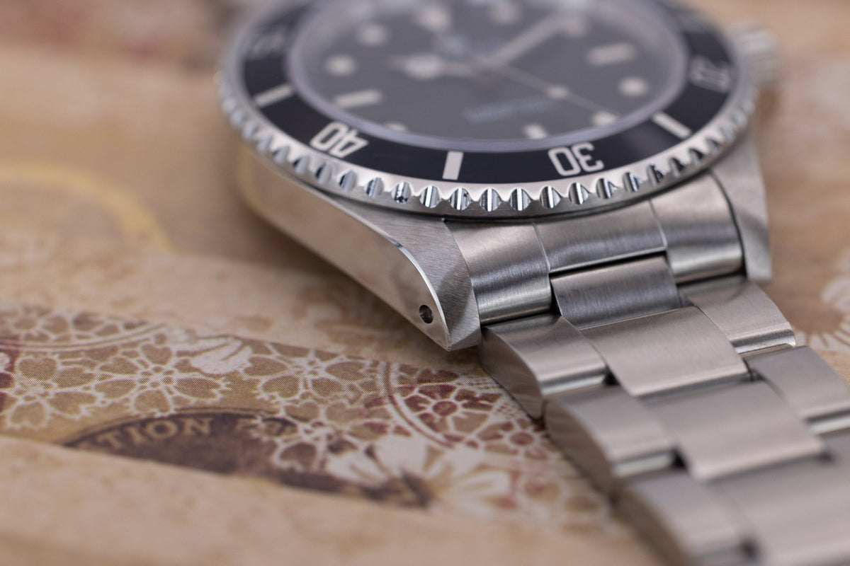 1996 Rolex Submariner Ref. 14060 | Tritium Dial | Box and Papers - Sierra Time Co
