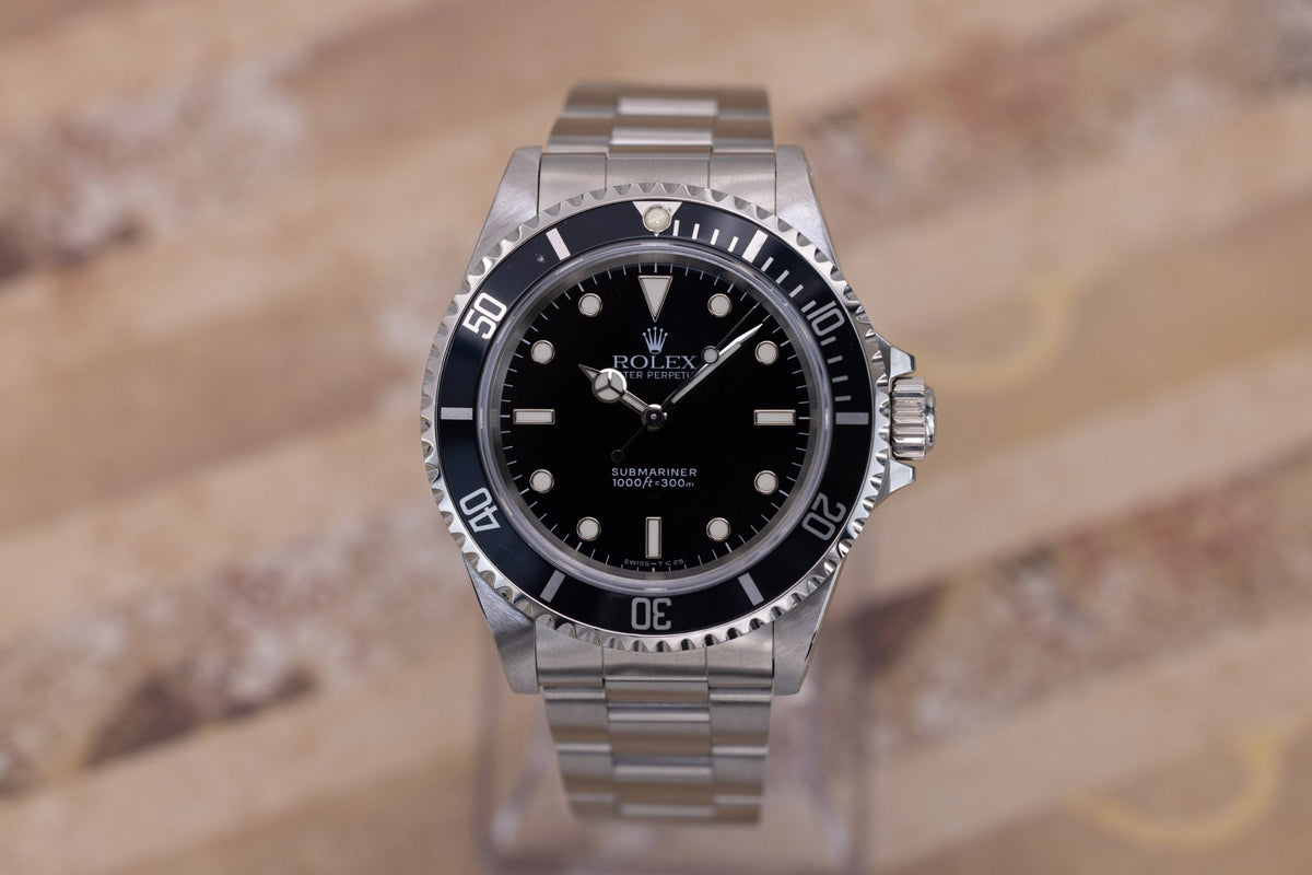 1996 Rolex Submariner Ref. 14060 | Tritium Dial | Box and Papers - Sierra Time Co