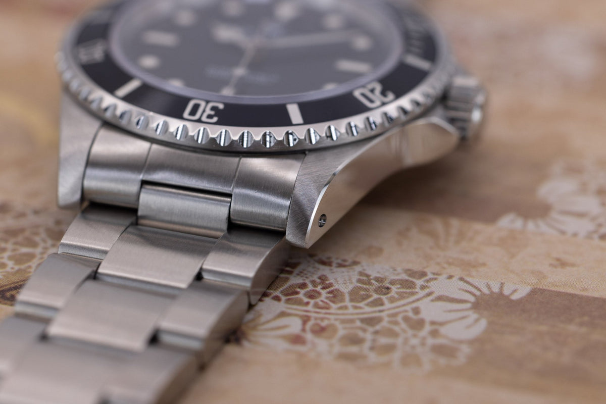 1996 Rolex Submariner Ref. 14060 | Tritium Dial | Box and Papers - Sierra Time Co