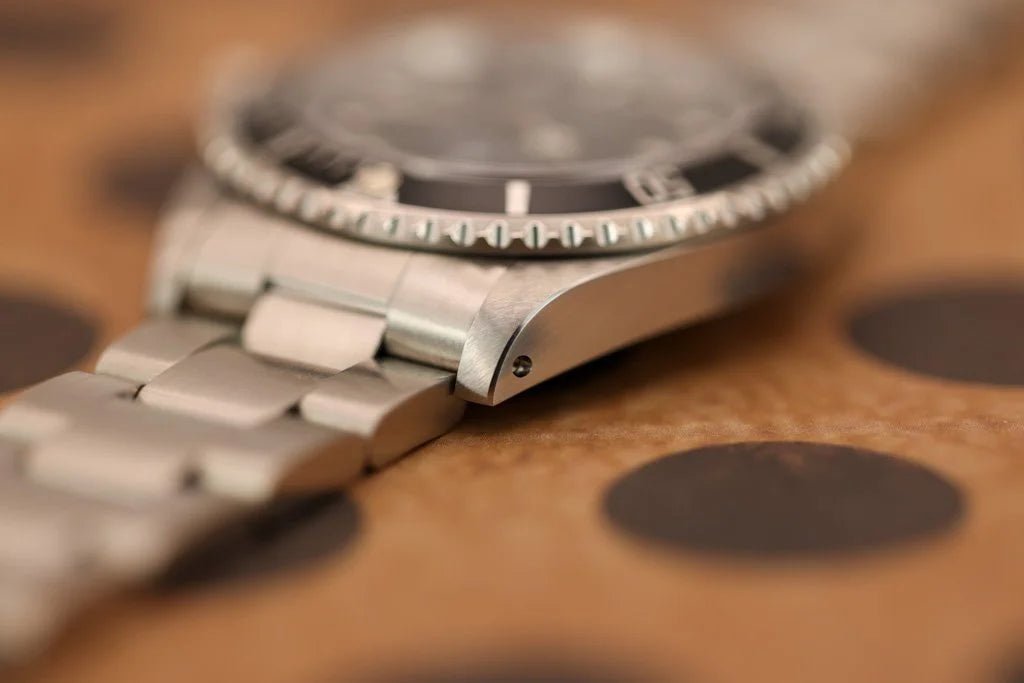 1997 Rolex Submariner Ref. 14060 | Creamy Patina | Box and Papers - Sierra Time Co