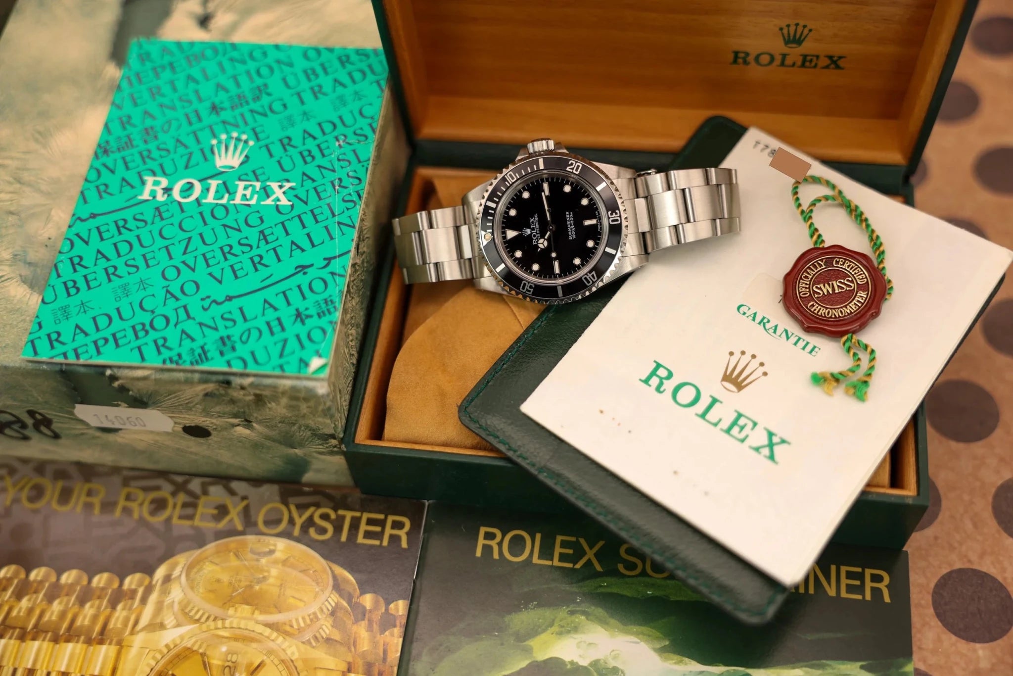 1997 Rolex Submariner Ref. 14060 | Creamy Patina | Box and Papers - Sierra Time Co