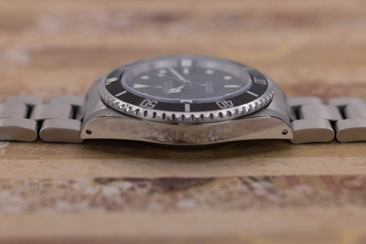 1997 Rolex Submariner Ref. 14060 | Tritium Dial | Box and Papers - Sierra Time Co