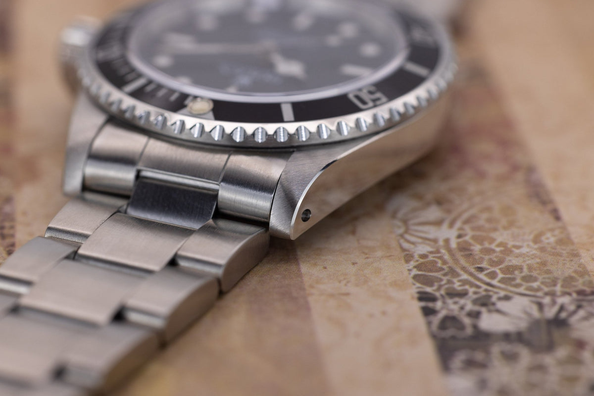 1997 Rolex Submariner Ref. 14060 | Tritium Dial | Box and Papers - Sierra Time Co