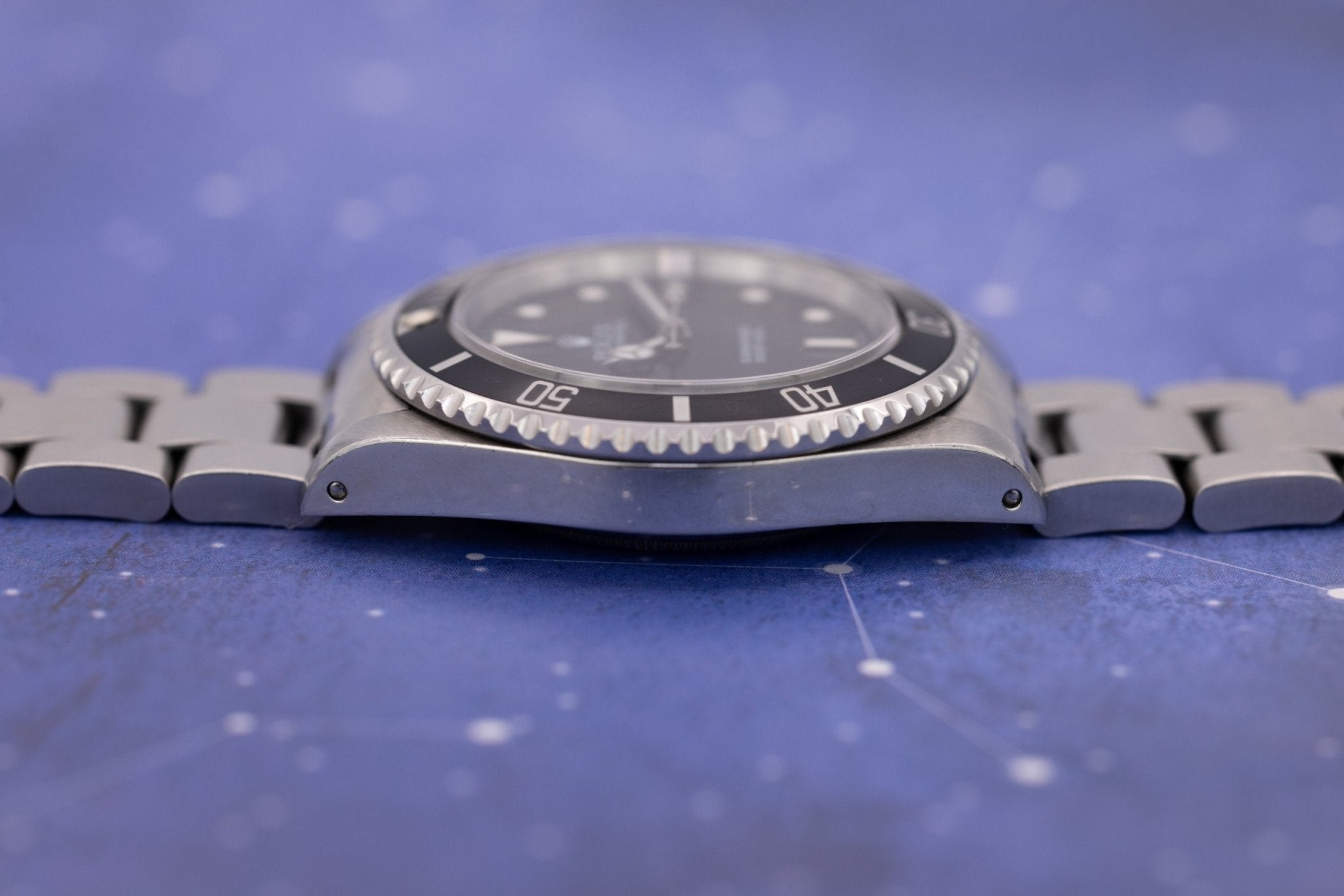 1997 Rolex Submariner Ref. 14060 | Tritium Dial | Navy Blue Bezel | Box and Papers - Sierra Time Co