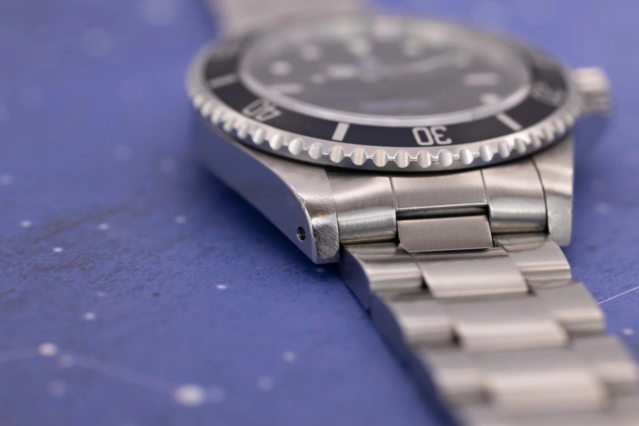 1997 Rolex Submariner Ref. 14060 | Tritium Dial | Navy Blue Bezel | Box and Papers - Sierra Time Co