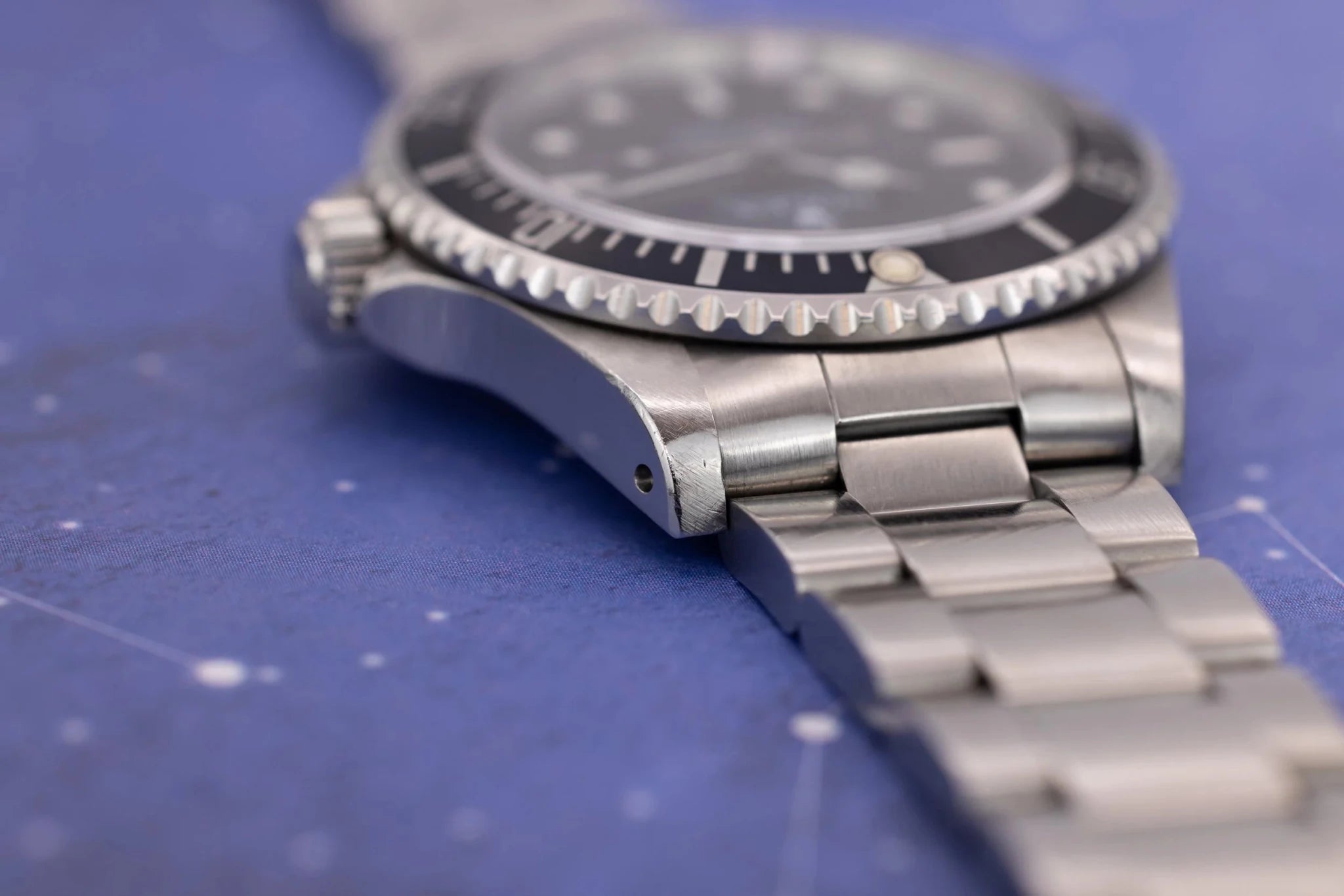 1997 Rolex Submariner Ref. 14060 | Tritium Dial | Navy Blue Bezel | Box and Papers - Sierra Time Co