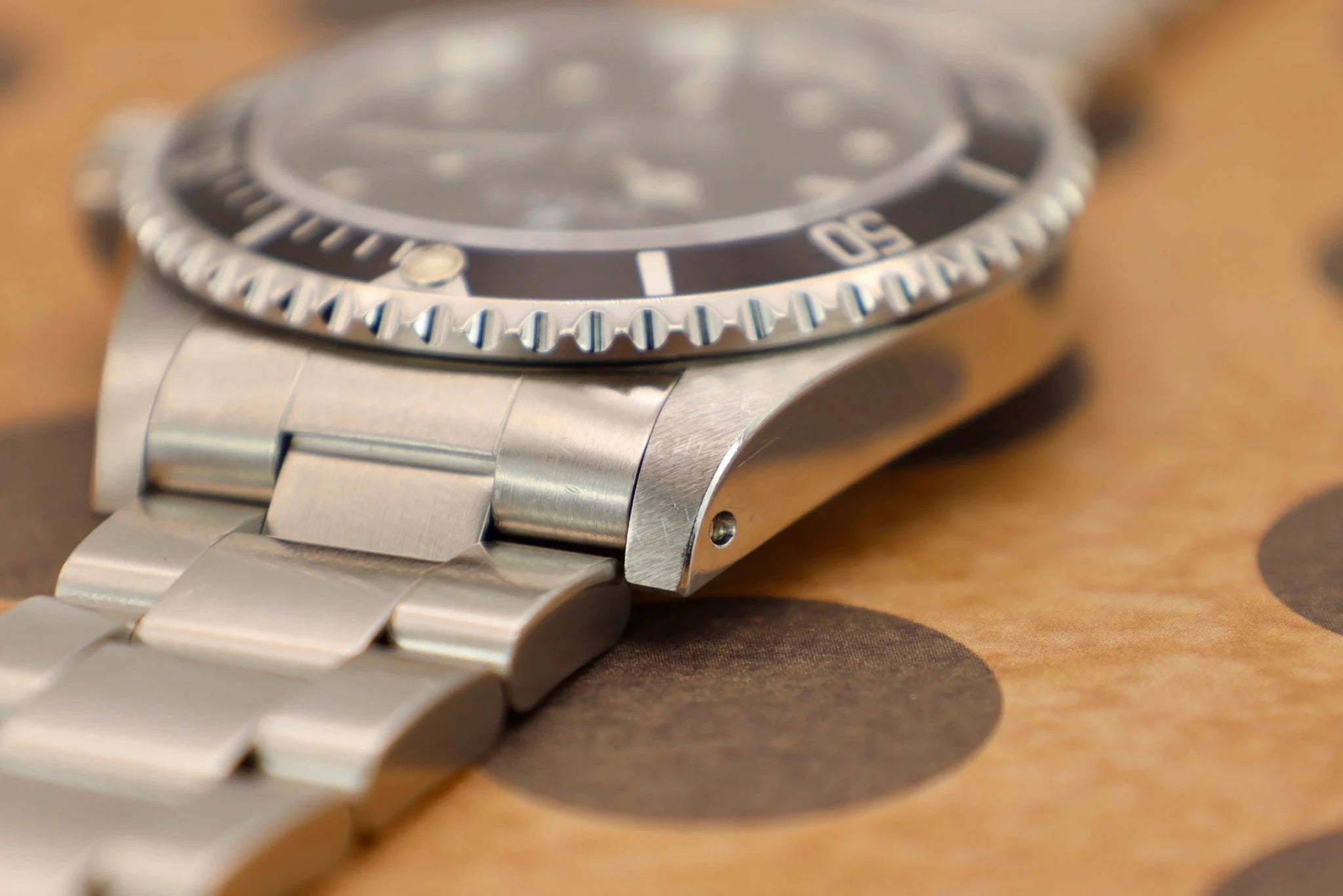 1998 Rolex Submariner Ref. 14060 | Creamy Patina | Box and Papers - Sierra Time Co