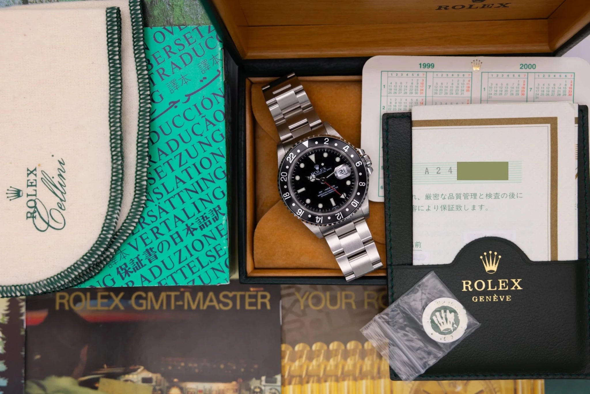 1999 Rolex GMT Master Ref. 16700 | Black Insert | Box and Papers - Sierra Time Co