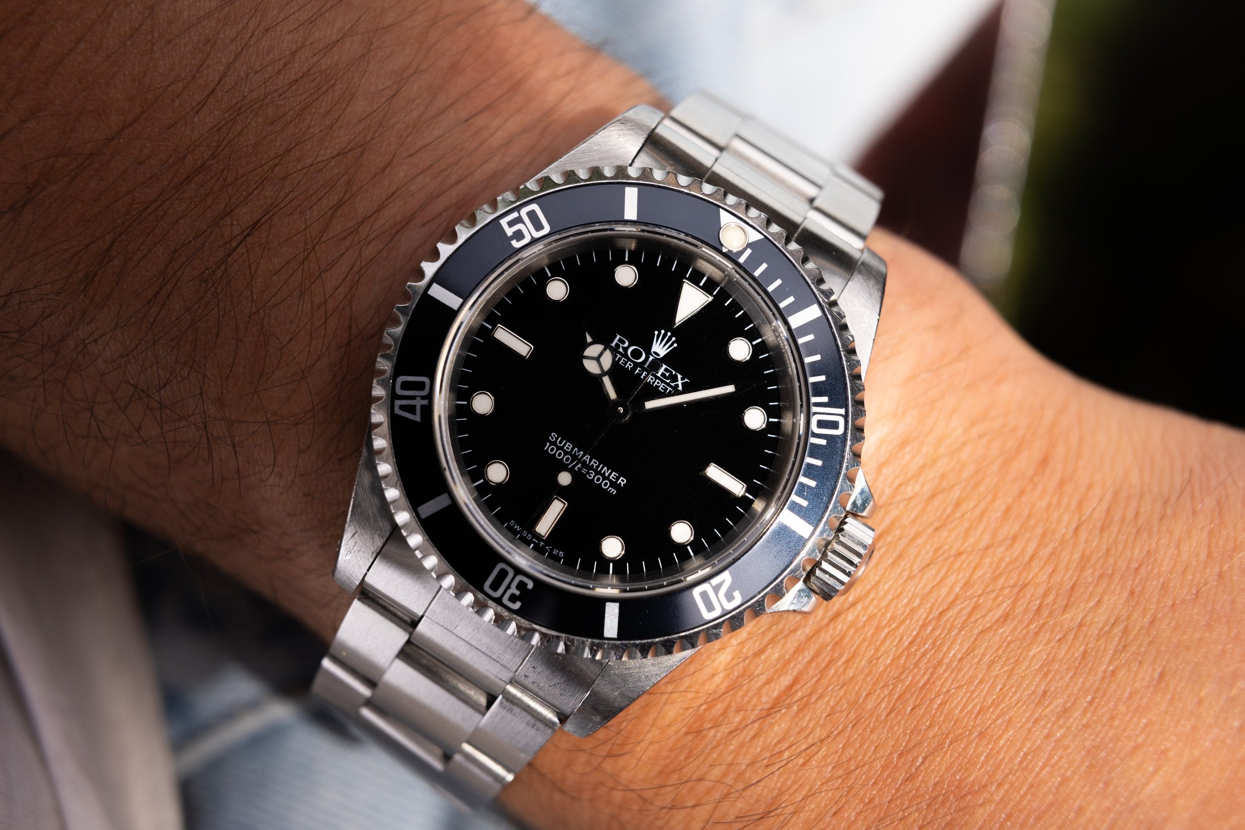1995 Rolex Submariner Ref. 14060 | Tritium Dial | Navy Blue Bezel | Box and Papers - Sierra Time Co.