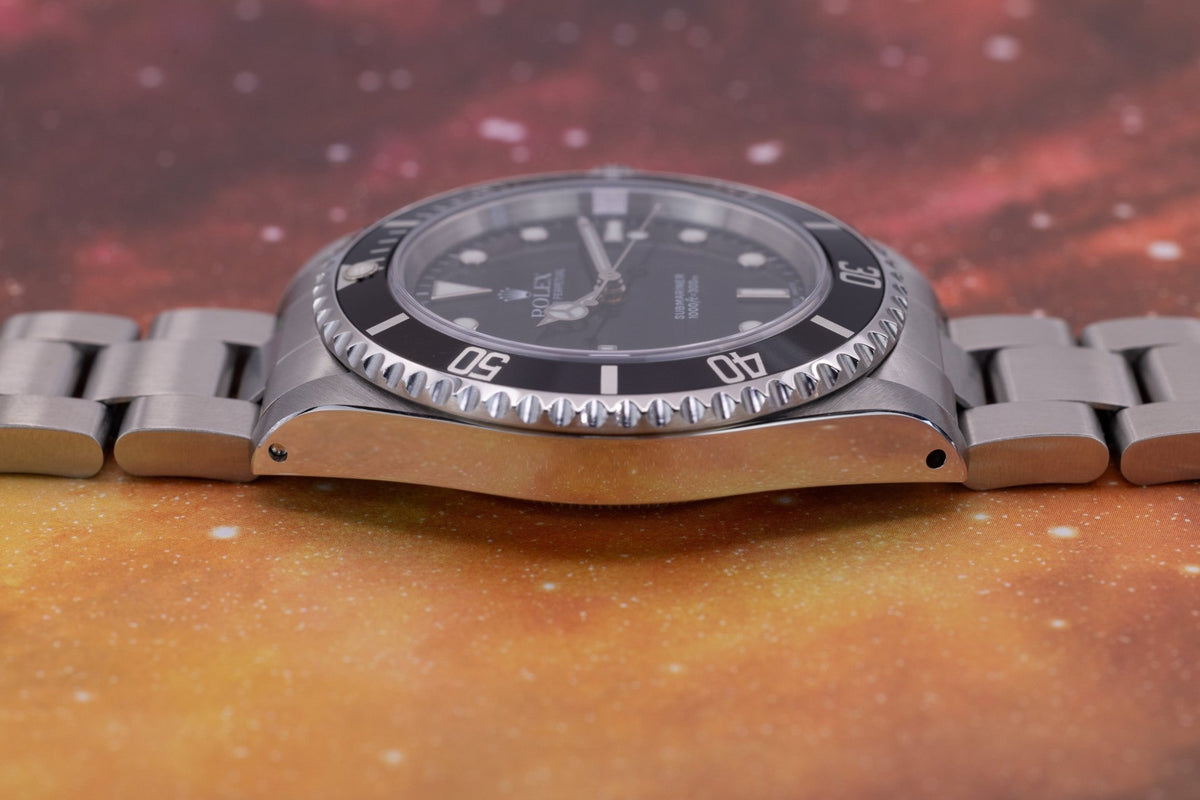2000 Rolex Submariner Ref. 14060 | Box and Papers - Sierra Time Co