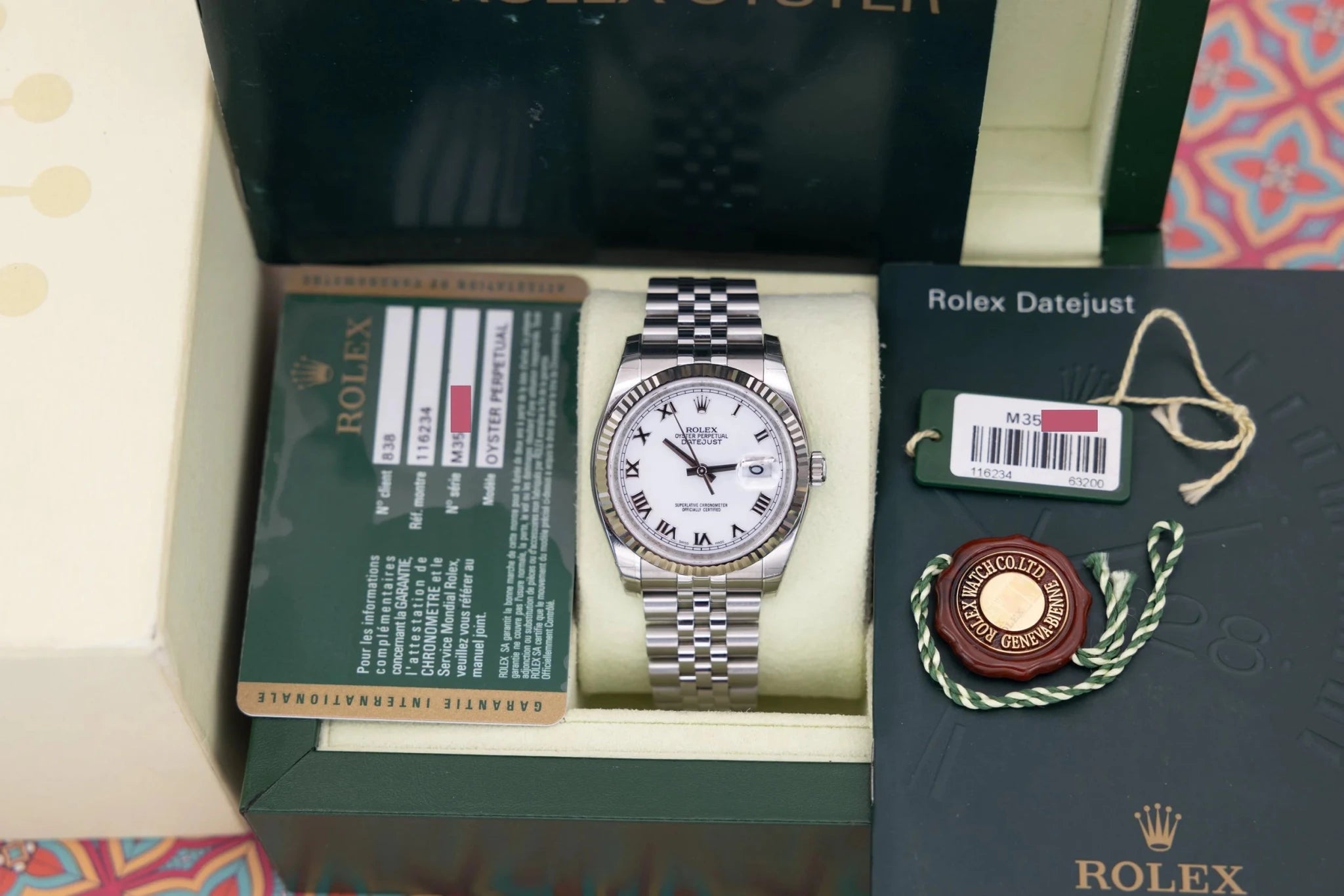 2008 Rolex Datejust Ref. 116234 | New Old Stock | White Roman Dial | Box and Papers - Sierra Time Co