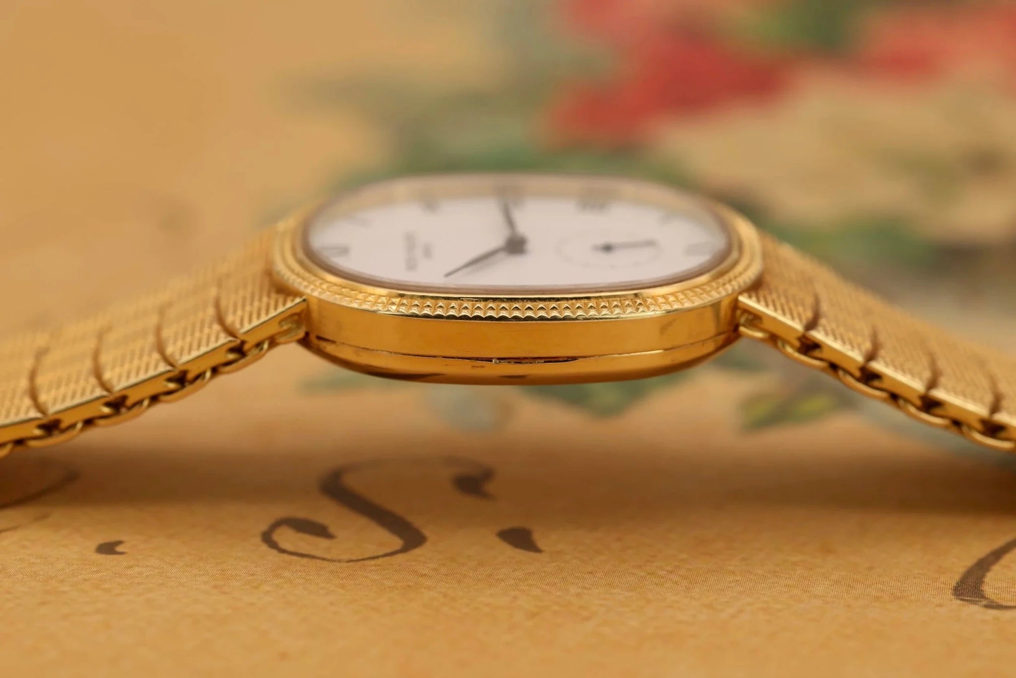 Patek Philippe Ellipse Ref. 3987 | 18K YG Mesh Bracelet | White Roman Dial - Sierra Time Co