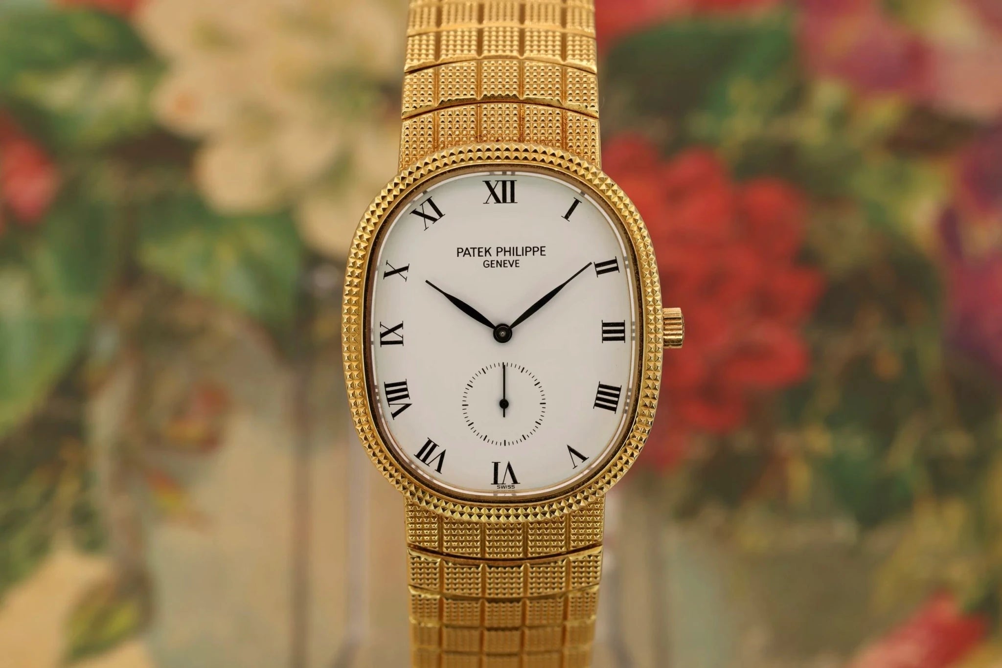 Patek Philippe Ellipse Ref. 3987 | 18K YG Mesh Bracelet | White Roman Dial - Sierra Time Co